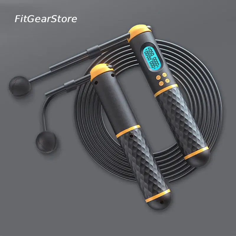 Digital jump rope with black and orange design on a gray background, featuring 'FitGearStore' branding.