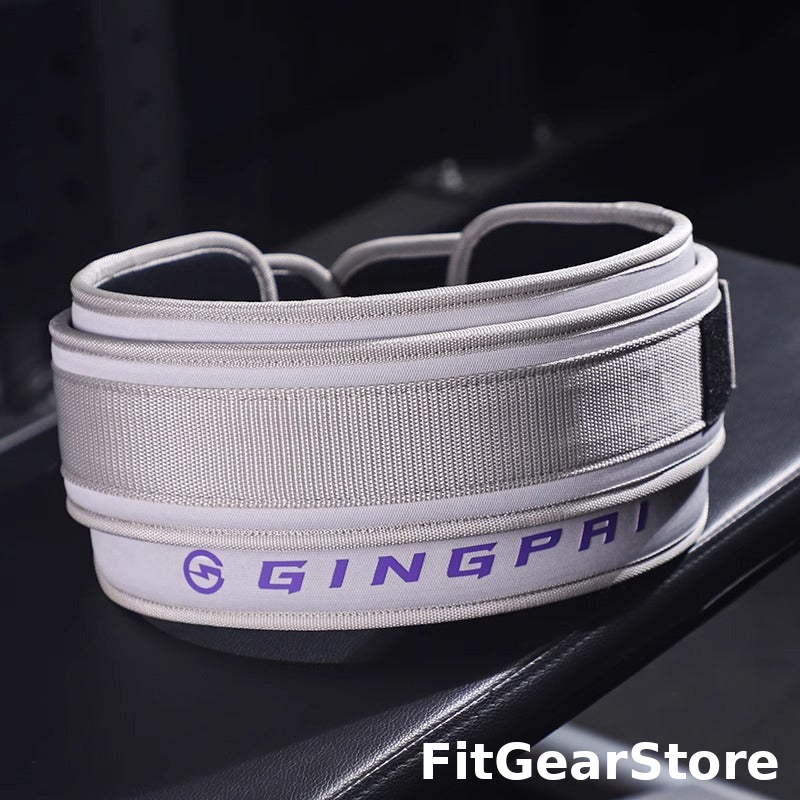Gray weightlifting belt with 'GINGPAI' branding on a dark surface, featuring the FitGearStore logo.